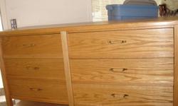 Very solid, well built, arborite top. 4 drawer dresser with false front showing additional 2 drawers (can be removed for extra storage).
 
60"wX20.5"dX29.5"h
 
$150 OBO
 
Please call and leave message if no answer, or email.
 
250-828-2943
 
**matching