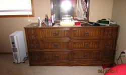 I have a dresser with mirror with matching tall boy dresser and one night stand for sale. In good condition. Asking $200 obo. Must sell.
Contact me at 547-2277