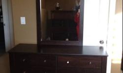 I'm selling a 4 piece queen/double bedroom set. Its dark brown in color. There is a 6 drawer dresser with a mirror, a night stand and a storage headboard that fits either a queen or double bed. It is Saunder brand from Sears. It is only a year old and in
