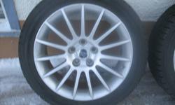 4 Toyo Observe Garit KX Studless Winter Tires, mounted on aluminum rims and ready to go, size 245-45-18 This is the environmental version of a studded tire, but better, instead of studs it has thousands of crushed walnut shells embedded in the tire tread