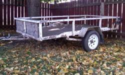 4 X 8 utility trailer, tilt deck, new lights and wiring, new class C (990 lbs) tires and 12 inch rims. New hubs and bearings last spring. 2000 lb axle. Plywood floor and sides. Spare tire available at extra charge. Good working condition.