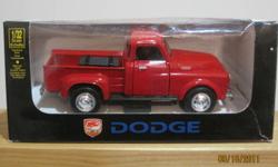 '52 Dodge Pickup - 1/32 scale, die cast collectible new in the box, excellent condition. Made by NewRay Toys.