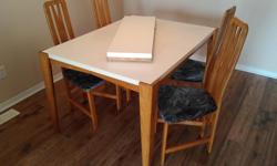Table extendable 12'. 4 chairs. Easy to take legs off for transport. Negotiable.