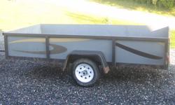 Utility Trailer for sale, 5' x 10', black metal frame, plywood walls and wood flooring, 2' ball.  $1000.00 of best offer.  Call 613-812-5523 for more infomation.