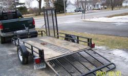 Welcome to all  and Thank you for looking at my add .This trailer is a real work horse I have put  1 1/2 yards of wet stone dust on and it hardly moved the springs .New wiring last year It can carry a riding lawn tractor on the front and a atv loaded from