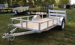 2011 Rail Side, 3500lb axle, 15" tires, fully treated wood deck, LED lights, NO exposed wiring, swivel jack, rear bi-fold ramp gate. 5 year frame warranty! Aluminum is 33% lighter than steel and doesn't rust! Great for ATV or M/C! Contact