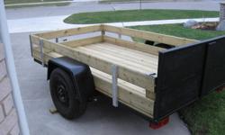 brand new 2x2 frame,5in pt deck boards folding tailgate brand new 14 in tires    no trades