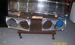 64 Plymouth grill and hood molding in excellent condition $100.00
 Lucan 519-227-1370