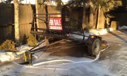 My grandfather is selling a 6 X 10 foot utility trailer that he made. It has not been used (to my knowledge. If it has been used it would have been very very minimal) and is in excellent shape. It has just been sitting in his shop and on the driveway with