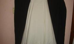 Beautiful Ivory size 14. Never Worn, has a matching shawl. Sarah Daniels wedding gown