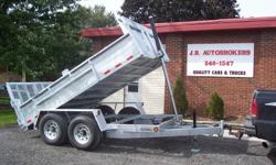 NEW  2012  GALVANIZED DUMP TRAILER  14000gvwr.
Structual features include:  7000lb slipper spring ride axles with radial 16" tires, adjustable 2"5/16" ball,  3 stage 7ton 108" lift ram,  Roller tarp, Two way double rear doors with intergrated drop ramps,