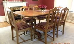 Antique dining room set includes: 52" long rectangular table that extends to 76" long with 3 leafs. 5 side chairs, 1 arm chair and buffet.
