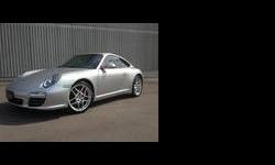 Arctic Silver Metallic on Black leather 997 C4S Coupe with low kms. Very nicely equipped with 6 gear manual, 19" Carrera S aluminium wheels and silver/black theme throughout. Options include Porsche crest embossed on heated black Sport Seats, seat backs