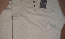 Abercrombie and Fitch long-sleeve shirt. NEVER WORN, tag is still on the shirt! Bought it for a Christmas gift. Size: Large.