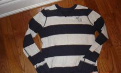 Each $5 - Navy and grey striped and green solid.  Both are size Large fits about a size 10.