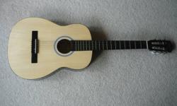 Vagabond Acoustic Guitar, Great for beginners ,
measures 38" from end to end and 14" at widest part.
Selling with replacement strings and picks.