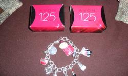 Pic #1
New Avon 125 Anniversary Charm Bracelet I have 2 of them $5.00 each
Pic #2
New Florence Gift Set
$10.00
 
Pic#3
New Christmas Charm Necklace Set
$10.00
 
Pic#4
  New Set of 3 Holiday Earrings Gift Set
$10.00
Pic#5
New Trio Anklet Bracelets Set