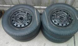 hey i have 4, 13" rims with Michelin X-radial all season tires. Rims are 4 bolt, were on my honda civic and i didnt need them anymore. Tires are P175/70R13 and have about a 4'' sidewall and are less than a season old, they still have a long life ahead of