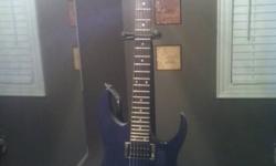 I am leaving the country and am selling my barely used blue electric guitar. It is an Ibanez RG320 FM in dark blue. The guitar comes with a case, guitar stand, tuner, picks, beginners book, strap, patch chord for amp all brand new. I also have a brand new