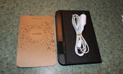 Amazon Kindle complete with Leather Case, USB cord and charger.
New condition. 5x7.7''