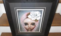 ANGELINA WRONA framed art print "ELOISE". Overall size is 17 1/2" wide x 19 1/2 " high, size of print is 9 1/2" wide x 12" high. This print has been professionally framed and double matted.
Over the past 10 years, Angelina's artwork has earned