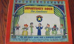 This game is very rare.    It says  The New Party Game with a Million Laughs.    This is in very good shape.