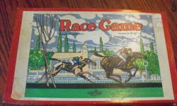 This is a very rare game called Race Game.  It is in good shape, just missing the die.