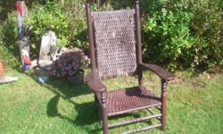 antique painted cane chair. great for sitting on a porch watching the sunrise/sunset..........