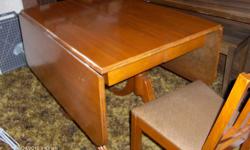 Antique Drop Leaf Table with 4 Chairs. Excellent condition. $400.00 - Call 306-543-9836