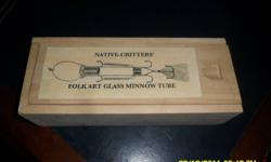 Here I have a very collectible Glass minnow tube fishing lure. { Never used!} Price is reasonable if you have ever seen glass lures they go for in the hundreds and BIG BUCKS. Very good condition and the box is in excellent shape.Buck tail feathers are