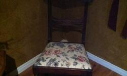 Beautiful antique nursing rocker and matching footstool. Mint condition.