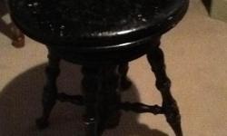 This is and Antique Piano Stool made by Thomas Bros. Its been painted black some time ago and could be left or repainted. Its very sturdy and spins ok has original ball and claw feet. Check out my other ads for more neat stuff.