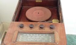 4 band radio
and phonograph
Power cord needs repair