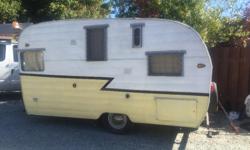 Up for sale is our vintage trailer,
Stove , fridge, bunk beds, no bathroom, light weight, aprox 14' use as is or restore, all the original parts are there, except the iconic wings on the outside which are being remanufactured. Used as dry storage
