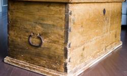 Beautiful antique trunk. Circa late 1800?s. The trunk is hand dovetailed. The aged wood highlights the wood grain and brings out the character in the wood. All of the hardware is hand forged.
 
The trunk provides for great versatility in use: coffee