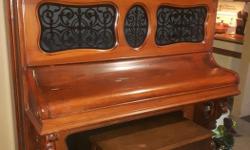 This Emerson piano built in 1877. It was built in Boston , Massachusetts.
The Emerson Piano Company built high quality, expensive pianos and used exotic woods and superior workmanship.
It is a very beautiful piece of furniture.
Piano bench is included
We