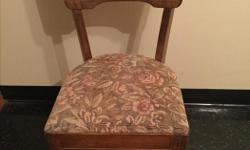 Antique solid wood chair with upholtered seat.