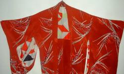 Authentic antique silk Japanese Kimono. Size large. Rust orange with bamboo leaf design and coordinating lining.