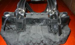 Authentic coach purse for sale. Black exterior, grey interior. Like new, excellent condition.