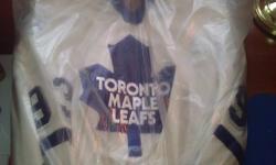 Authentic Licensed NHL team Jersey of Doug Gilmour's Toronto Maple Leafs Jersey. Located in Smooth Rock Falls.  asking 200$ Raising money for vet bills,  its the only reason im selling.  call 705-262-1069 .