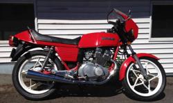 1980 Suzuki gs400 factory cafe racer. 3rd owner with clean paperwork & 39xxx original kms. Just had tune up, brand new battery, plugs, oil, etc.. Runs good & everything works well, very fun/nimble lil ride! Would easily qualify for collectors plate, but