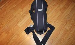 This is a navy colored Baby Bjorn Carrier.  In excellent condition.