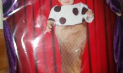 Brand New in Sealed Packaging. "Cinema Secrets" Baby Ice Cream Cone. This is a very cute Bunting Costume. Costume includes: Flannel sugar cone shaped bunting with piping and an ice cream scoop top with appliqued chocolate chips---With a cherry on top!