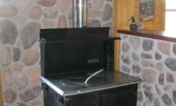 Bakers Choice Wood Cookstove Brand New
Certified, Amish Made, Heat 2,000 sq ft
Starts @ $1,680.00
Options Available: Warming Closet or Shelf, Water Reservoir, Extra Firebrick, Water Coil, Crating.
For More Info, Shipping, Viewing Stoves, Etc., Contact