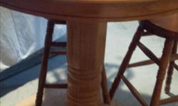 Solid Oak Table and 2 chairs
with glass tabletop protector
bar height