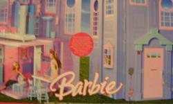 Barbie house, box unopened. Comes with two dolls. Would make great gift.