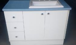 Create a well-organized bath. Linen, towels, toiletries, tidy & accessible with this 3 drawers, 2 doors, white vanity.
Features:
Ceramic Square Sink gracefully face everyday use (size of sink: 23-1/8" x 18-3/4")
Blue Counter top
Dimension of Vanity: 44"