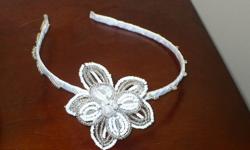 I am selling beaded hairbands. They are only $15.
They are metal - wrapped with satin and beads with beaded flower.
Make really nice gifts and stocking stuffers.
I can make them in any colour you need.
Please e-mail me with any requests and check out my