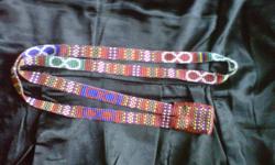 Custom beaded landyards, make an order or I have a couple finished for sale.  I can also make beaded change purses, cell phone holders, handbags, hat bands, belts, guitar straps, earings, necklaces, the list goes on... custom made to your liking.