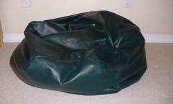 Bean bag chair for sale.  Forest green and leather.  Has double zipper to keep "beans" in.  Chair is in great condition, we just don't use it anymore.  Asking $50 OBO.  Pick up in Fergus.
